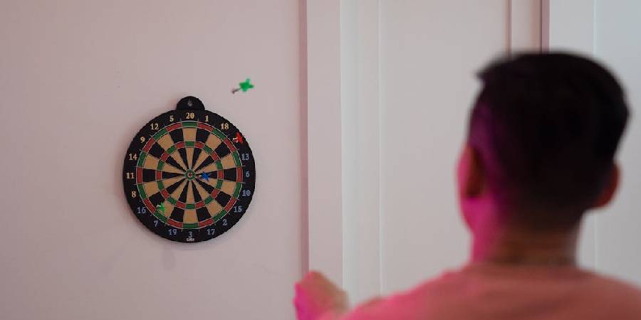 In the Game of Darts, Points Are Scored by Throwing Small Missiles